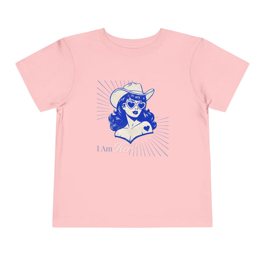 Toddler Tee — Retro Cowgirl Graphic “I Am Her” Pink Short Sleeve T-Shirt